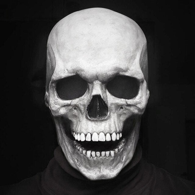 Human Head Skull Mask With Movable Jaw worn as a Halloween costume