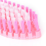 FLEXIBLE HAND-HELD CLEANING BRUSH